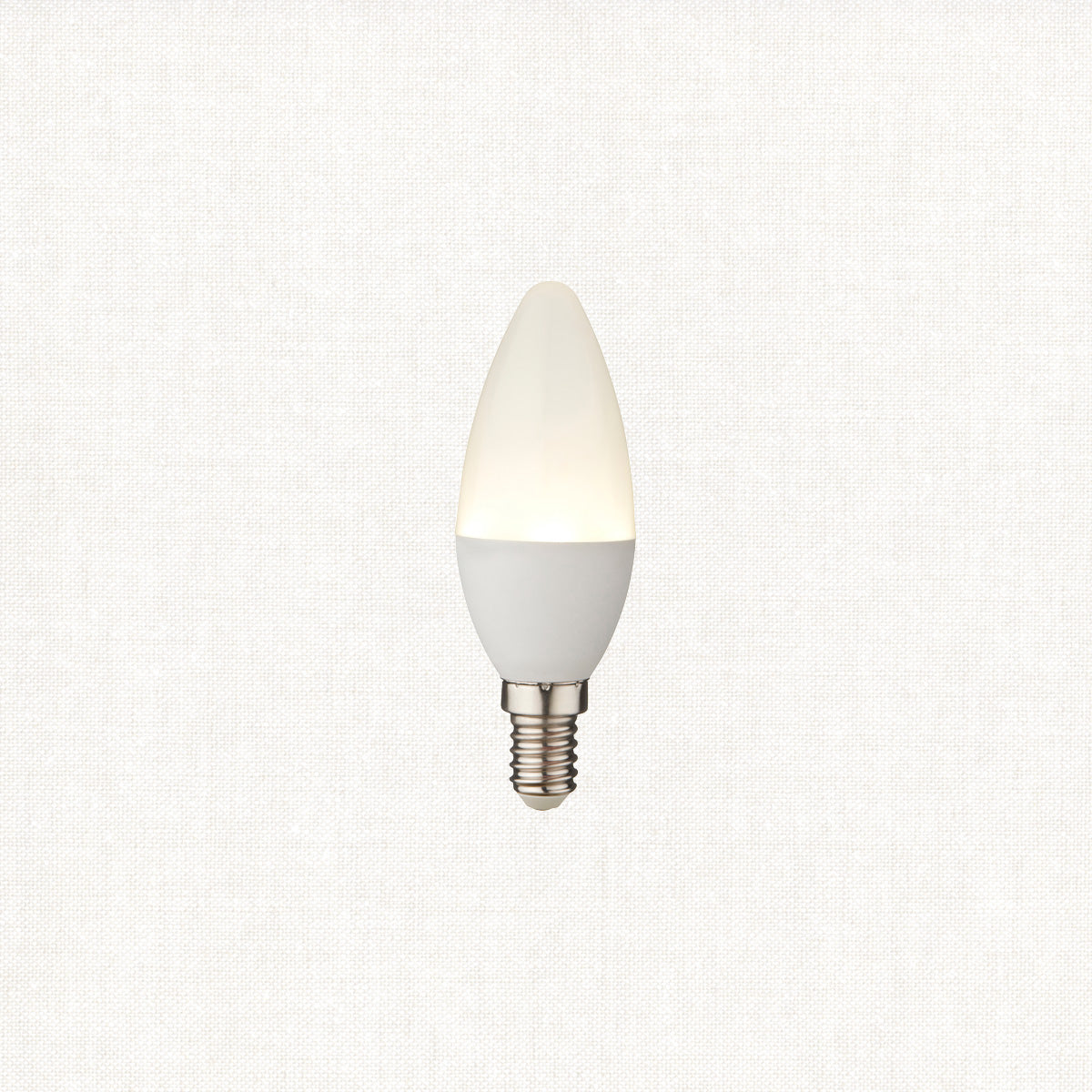 Cool white LED candle light bulb on a white background