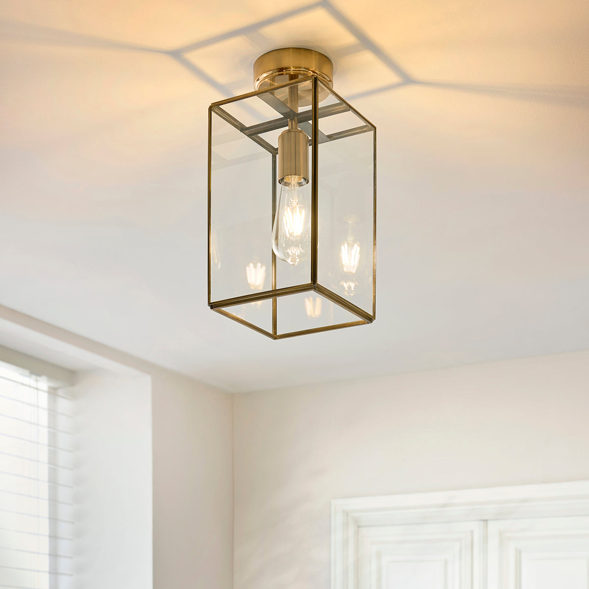 Brice Flush Light in Antique Brass