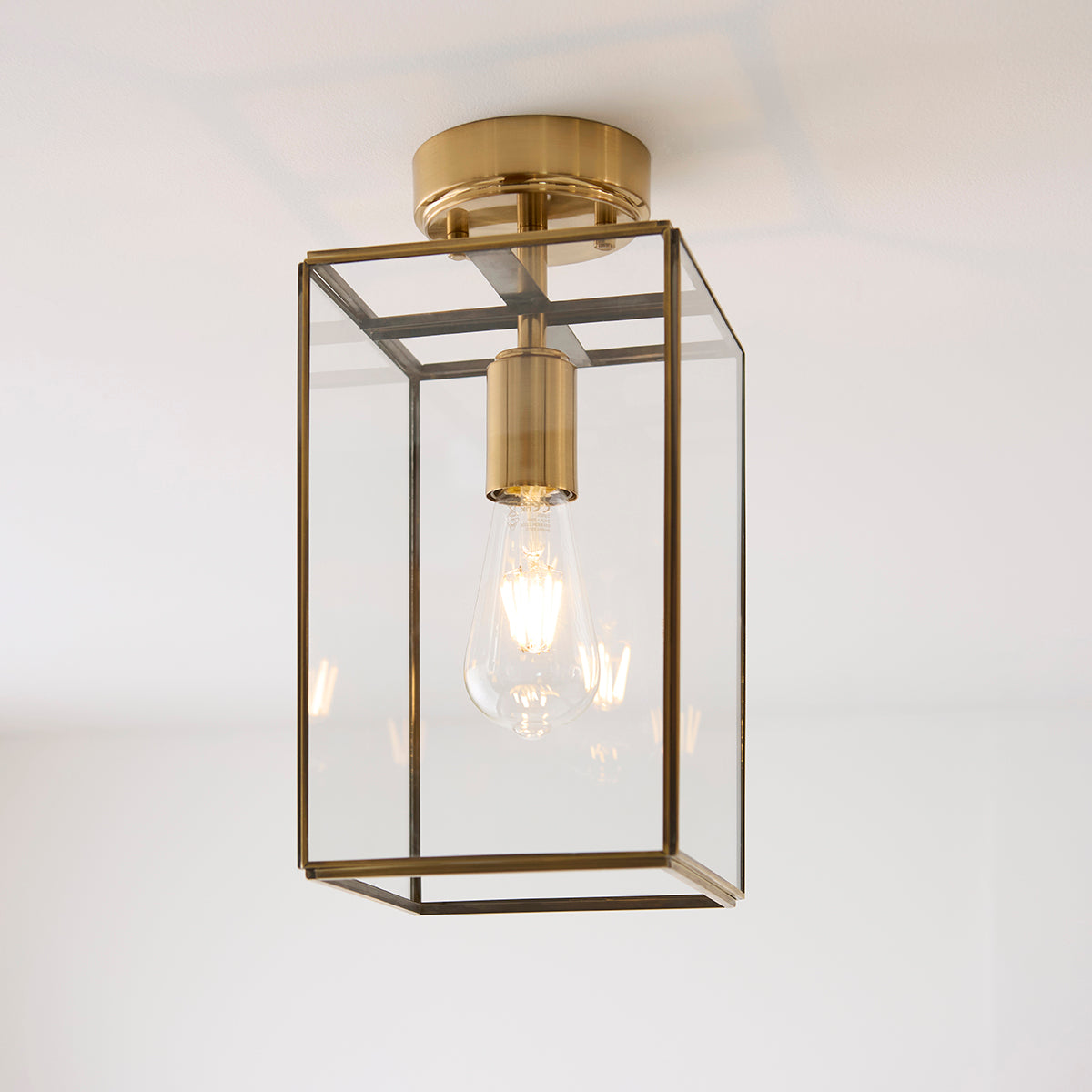 Brice Flush Light in Antique Brass