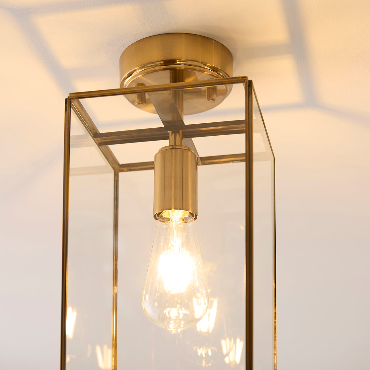 Brice Flush Light in Antique Brass