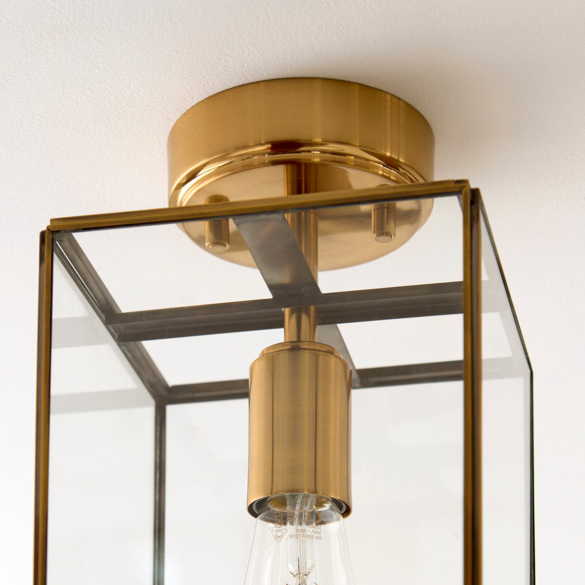 Brice Flush Light in Antique Brass