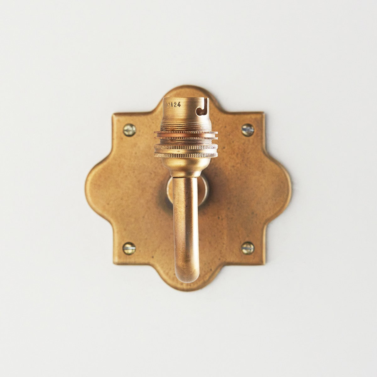 Rivet Curva Antique Brass Wall Light with Artisan Sand Casting
