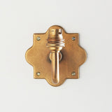 Rivet Curva Antique Brass Wall Light with Artisan Sand Casting