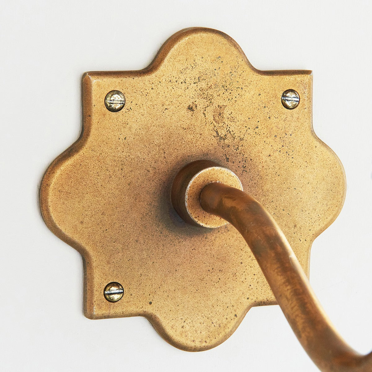 Rivet Curva Antique Brass Wall Light with Artisan Sand Casting