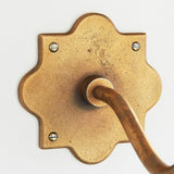 Rivet Curva Antique Brass Wall Light with Artisan Sand Casting