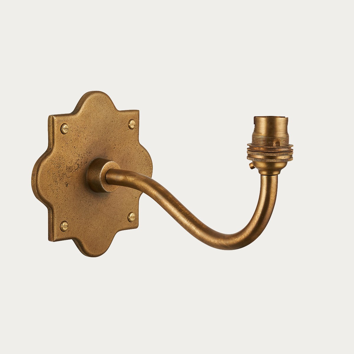 Rivet Curva Antique Brass Wall Light with Artisan Sand Casting
