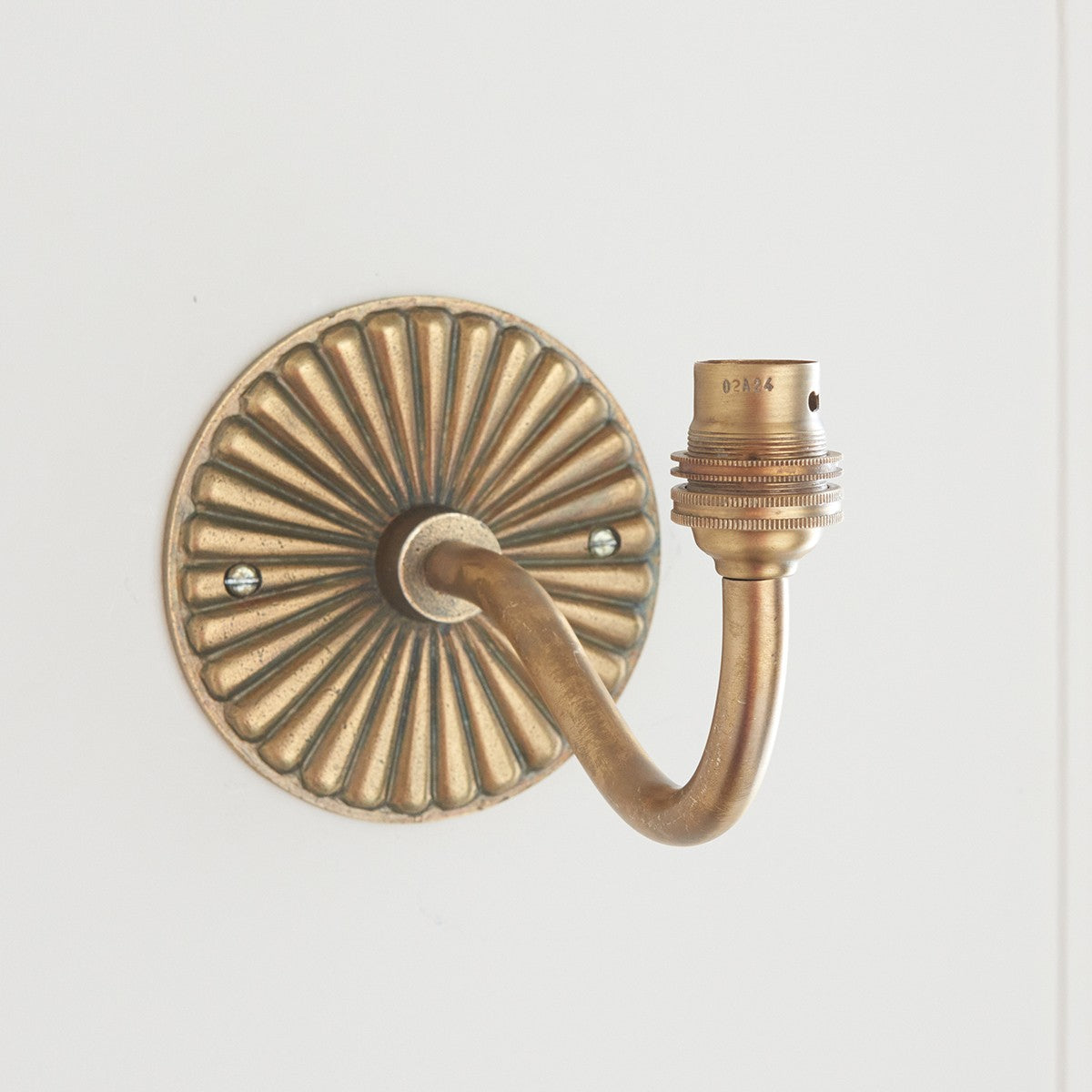 Dalara Curva Sconce Wall Lighting Fixture in Antique Brass with Artisan Sand Casting