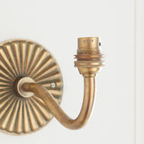 Dalara Curva Sconce Wall Lighting Fixture in Antique Brass with Artisan Sand Casting