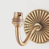 Dalara Curva Sconce Wall Lighting Fixture in Antique Brass with Artisan Sand Casting