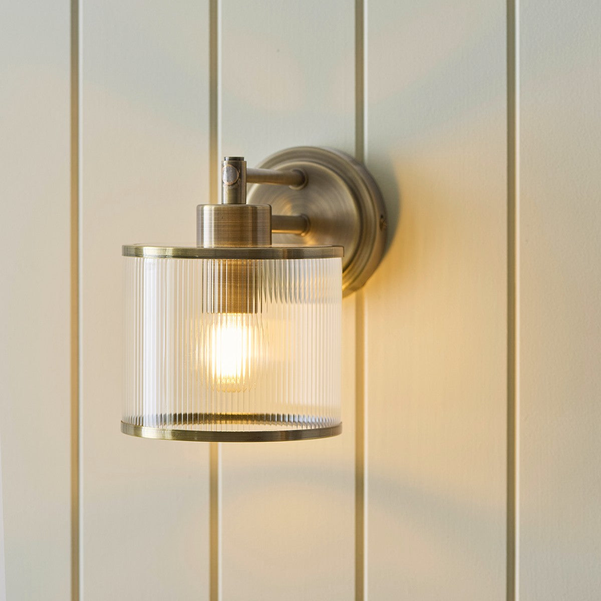 Radley Wall Lamp with Ribbed Glass and Antique Brass