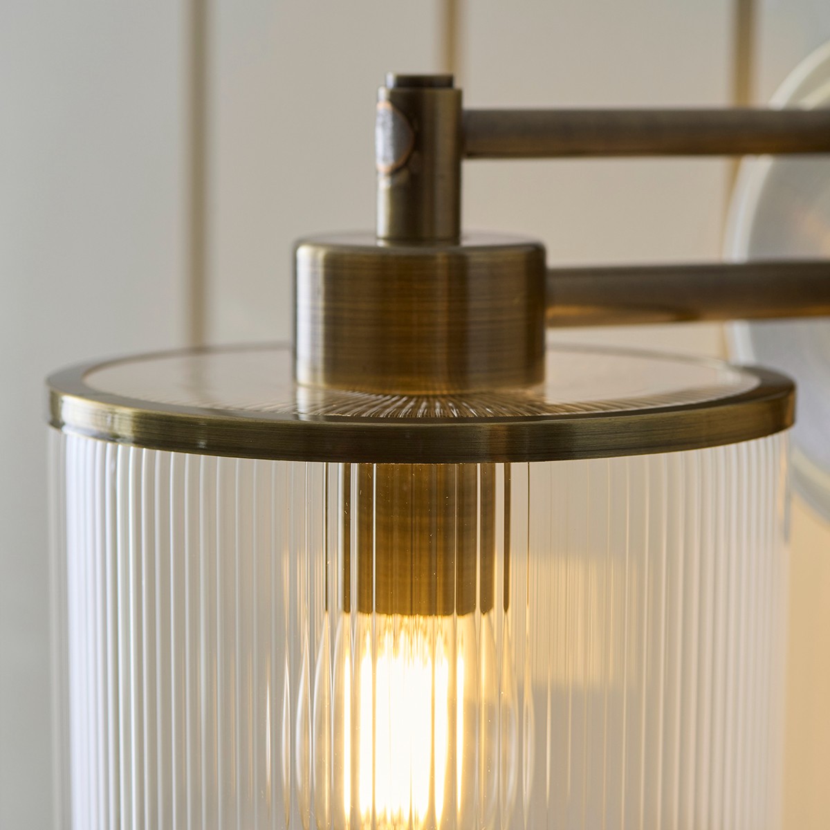 Radley Wall Lamp with Ribbed Glass and Antique Brass