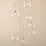 Osla 12 Light Giant Ceiling Light with Antique Brass