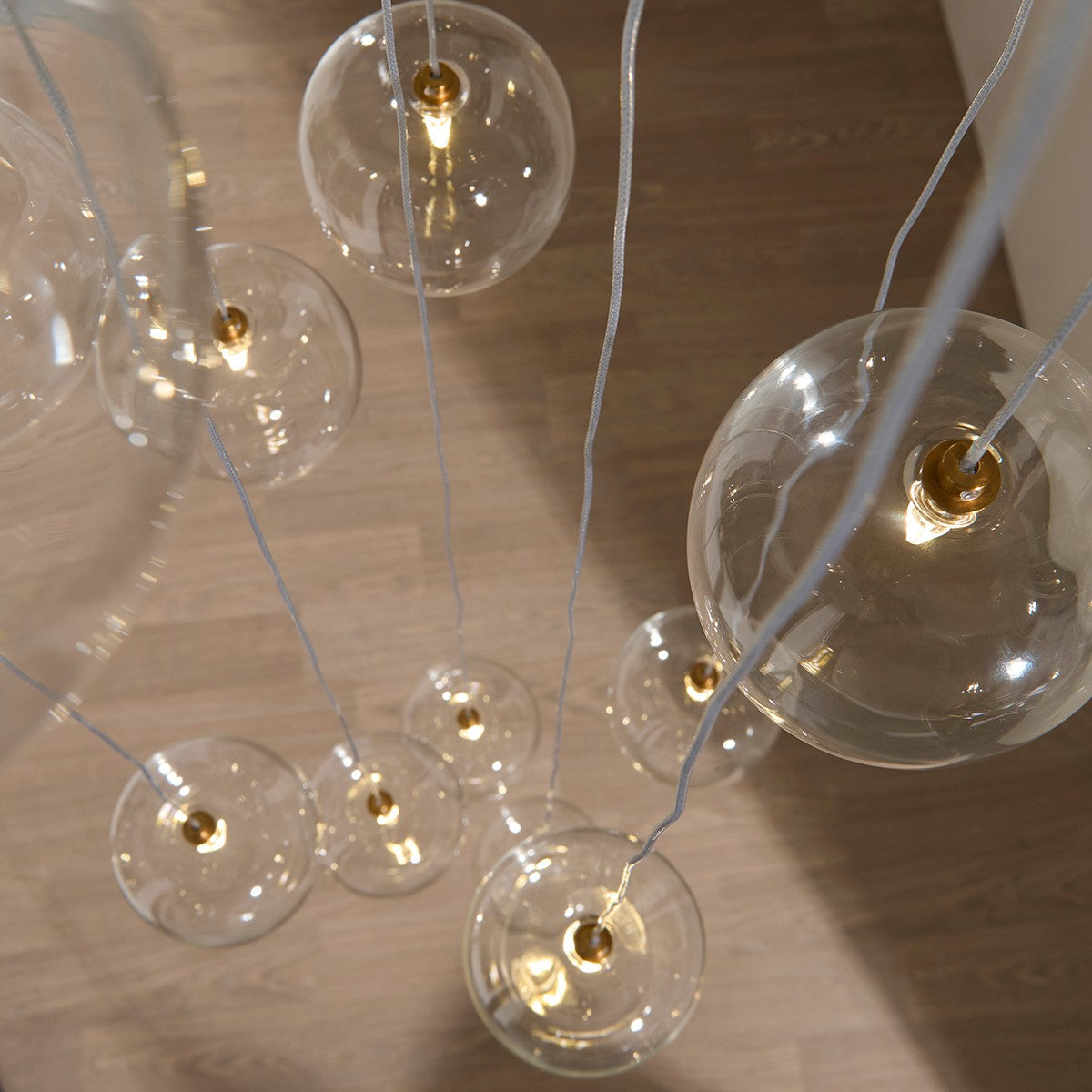 Osla 12 Light Giant Ceiling Light with Antique Brass
