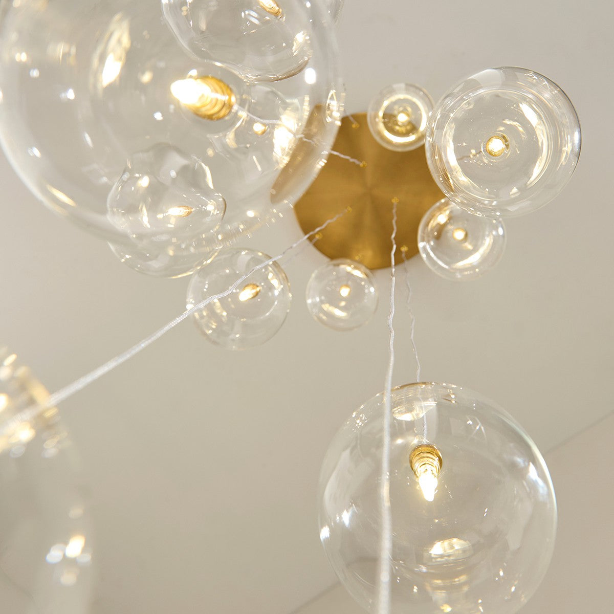 Osla 12 Light Giant Ceiling Light with Antique Brass