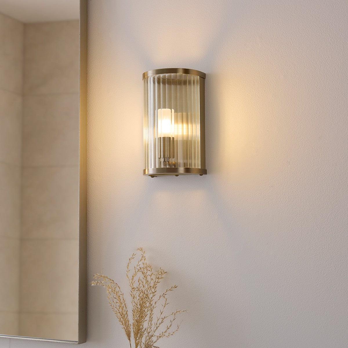 Radley Bathroom Wall Light in Antique Brass with Ribbed Glass