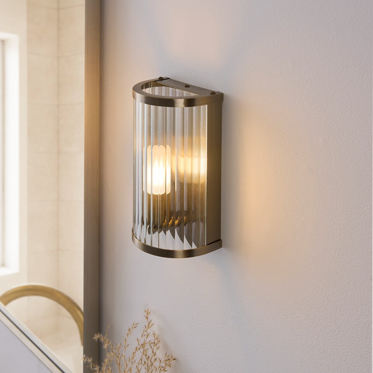 Radley Bathroom Wall Light in Antique Brass with Ribbed Glass