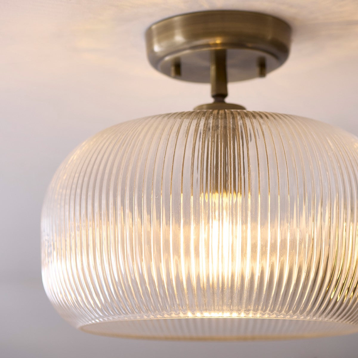 Harmont Ceiling Light Fixture Flush Mounted in Antique Brass and Ribbed Glass