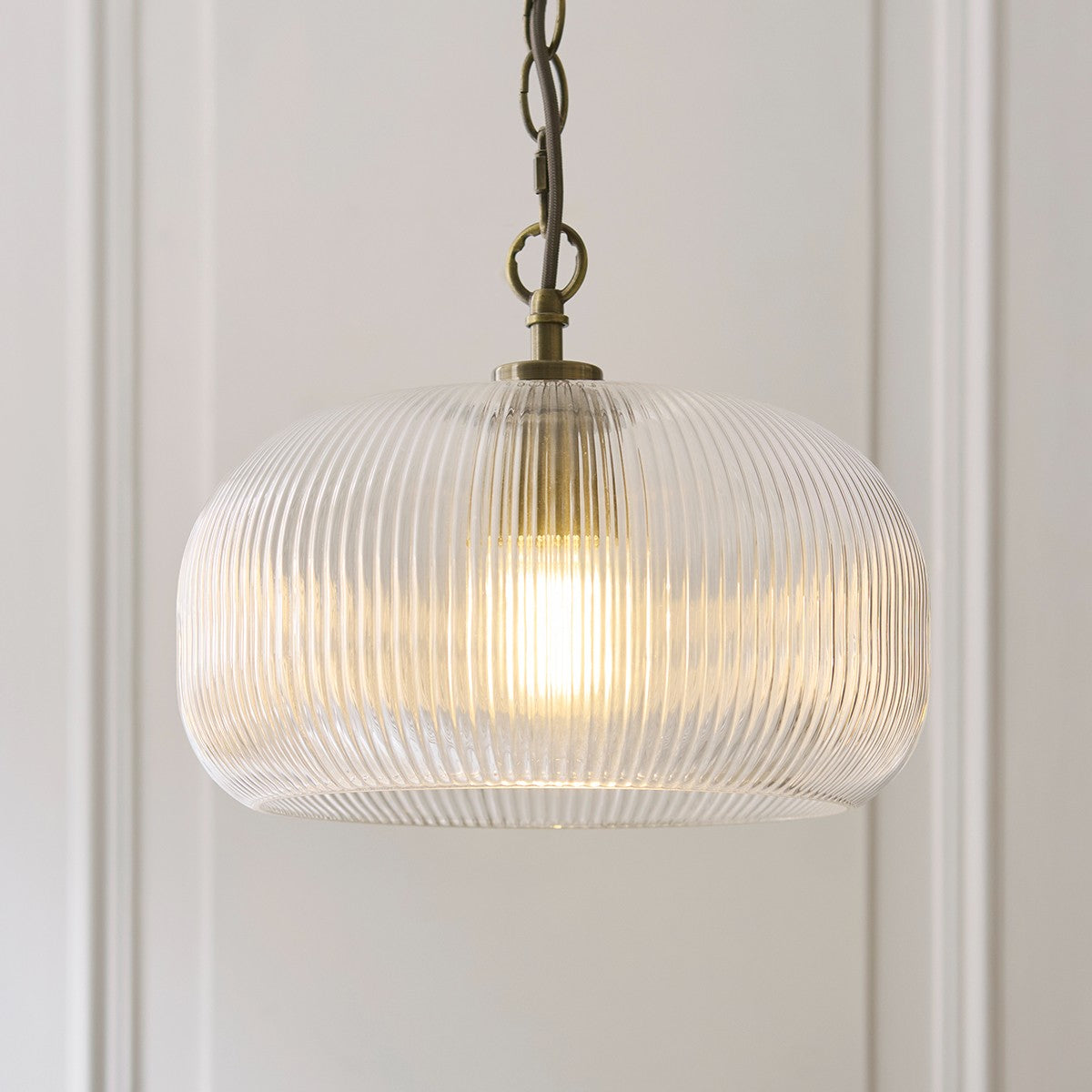 Harmont Ribbed Glass Globe Pendant Light in Antique Brass