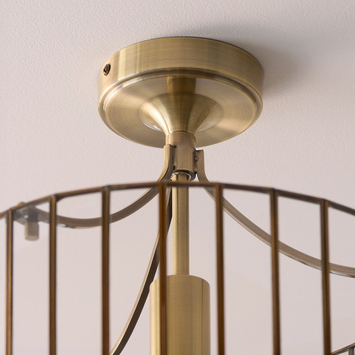 Antara Flush Mount Ceiling Light with Antique Brass and Clear Glass