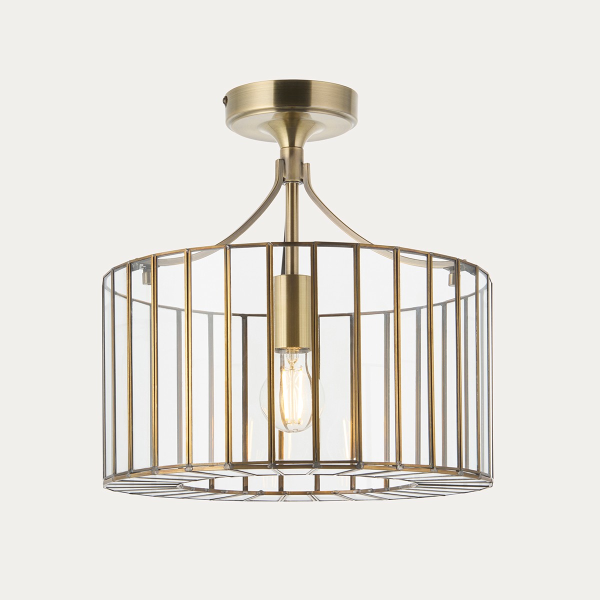 Antara Flush Mount Ceiling Light with Antique Brass and Clear Glass