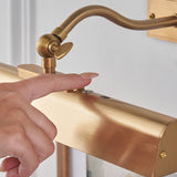 Loras Wall Picture Light with Battery Operation in Warm Brass