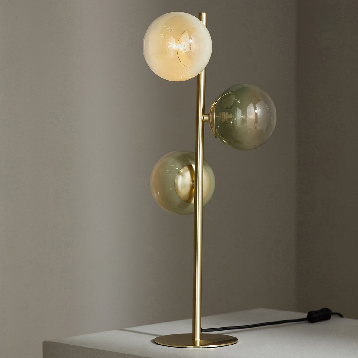 MADE Globe Green Glass Table Lamp in Brushed Brass with Buttermilk Ombre Glass