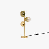 MADE Globe Green Glass Table Lamp in Brushed Brass with Buttermilk Ombre Glass