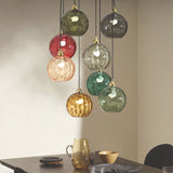 MADE Ilaria 8 Light Large Ceiling Light with Green Glass Lamp Shades and Polished Brass Details
