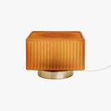 MADE Ribbed Table Lamp with Amber Glass and Brushed Silver Detailing