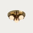 MADE Layla Wooden Flush Ceiling Light in Antique Brass with Opal Glass Lamp Shades
