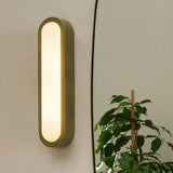 MADE Nura Antique Brass Bathroom Wall Light with Opal Glass