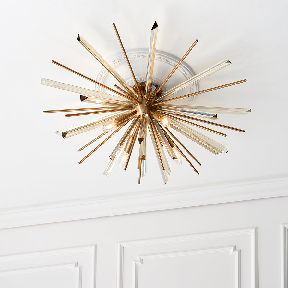 Juno Flush Starburst Ceiling Light in Antique Brass