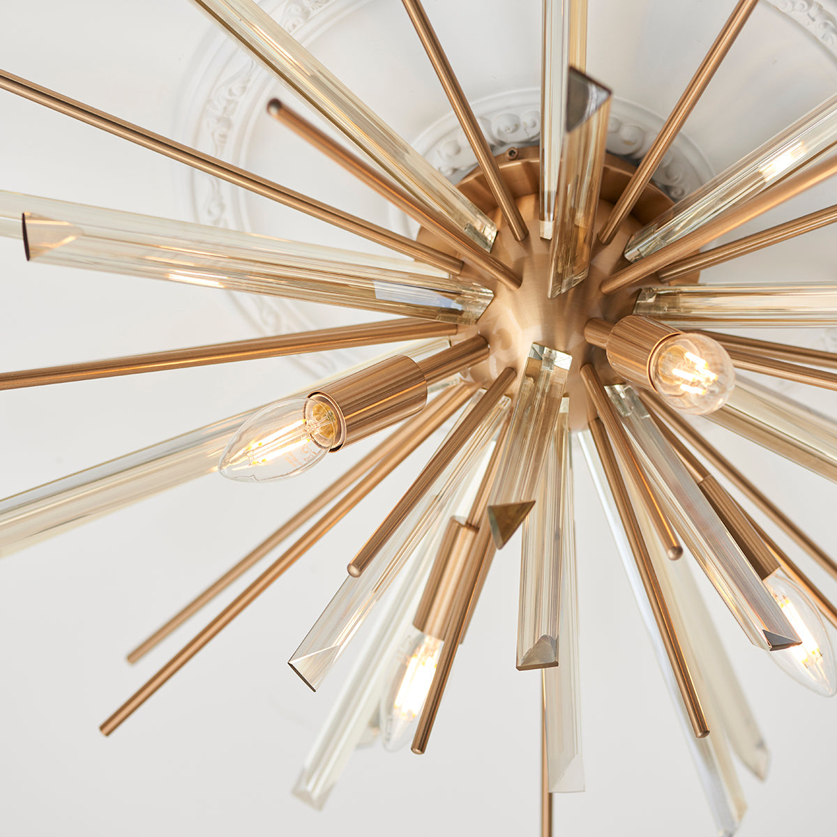 Juno Flush Starburst Ceiling Light in Antique Brass