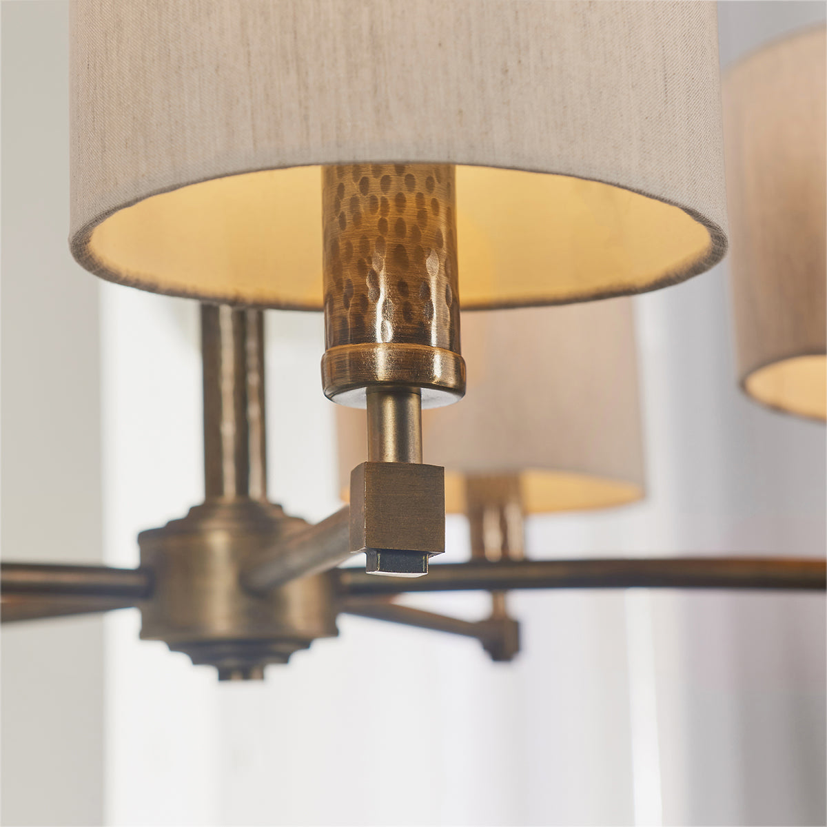 Isaac Five Light Pendant in Hammered Bronze
