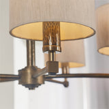 Isaac Five Light Pendant in Hammered Bronze