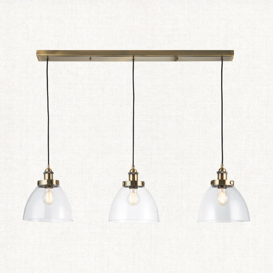 Marlowe Clear Glass Three Light Pendant in Antique Brass