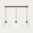 Marlowe Clear Glass Three Light Pendant in Antique Brass