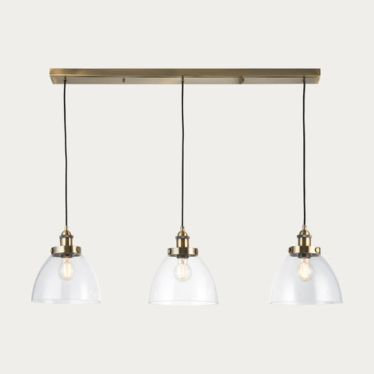 Marlowe Clear Glass Three Light Pendant in Antique Brass