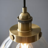 Marlowe Clear Glass Three Light Pendant in Antique Brass