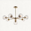 Madeline Spiral Glass Eight Light Pendant in Antique Brass