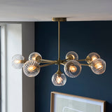 Madeline Spiral Glass Eight Light Pendant in Antique Brass