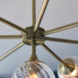 Madeline Spiral Glass Eight Light Pendant in Antique Brass