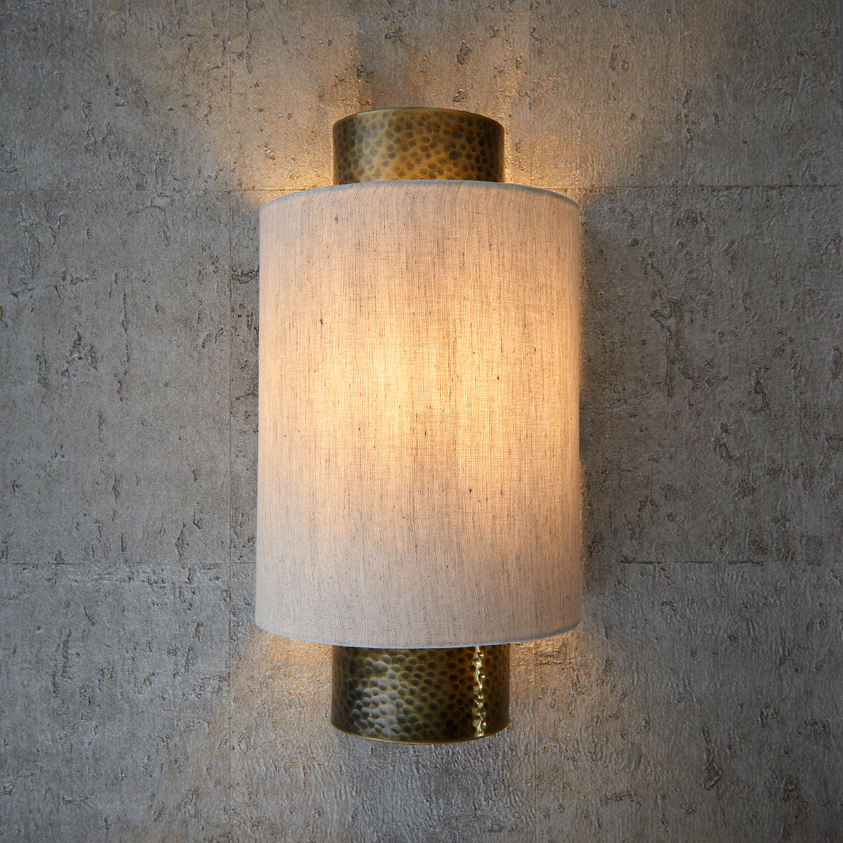 Isaac Wall Light in Hammered Bronze