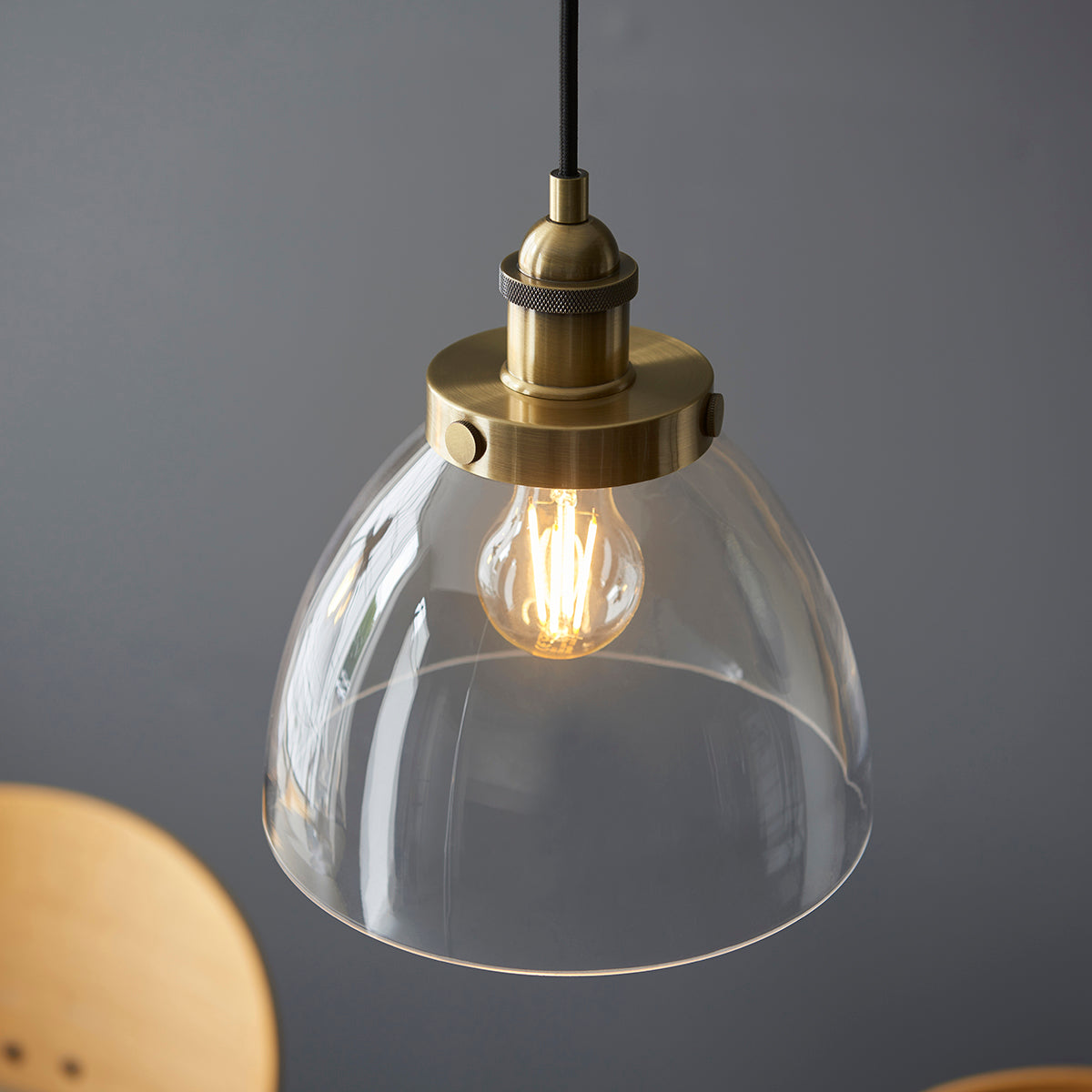Marlowe Clear Glass Three Light Pendant in Antique Brass